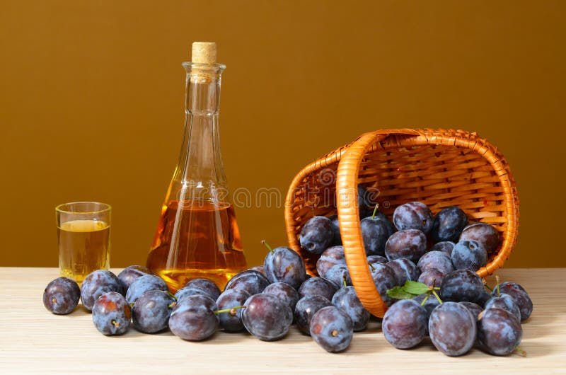 Brandy and plums stock photo. Image of organic, bottle 58024908