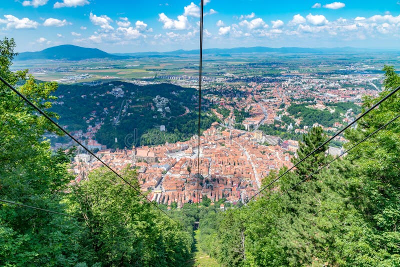 Brasov city viewed from the cable car leading to Tampa Mountain in Brasov, Romania royalty free stock photography Brasov city viewed from the cable car leading to Tampa Mountain in Brasov, Romania royalty free stock photography