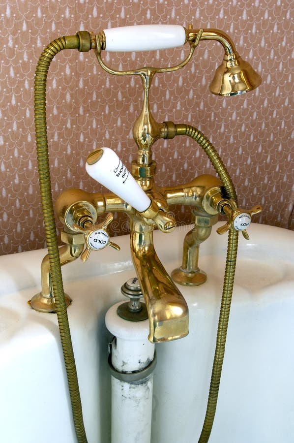 Brass bath taps stock image. Image of plug, brass, gold 4117257