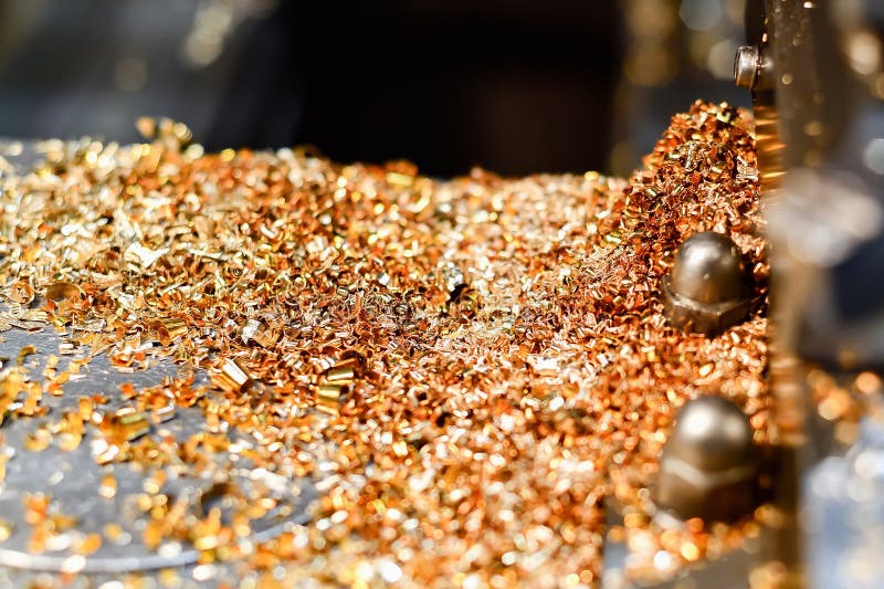Brass and Bronze Shavings on a Lathe after Processing Nonferrous