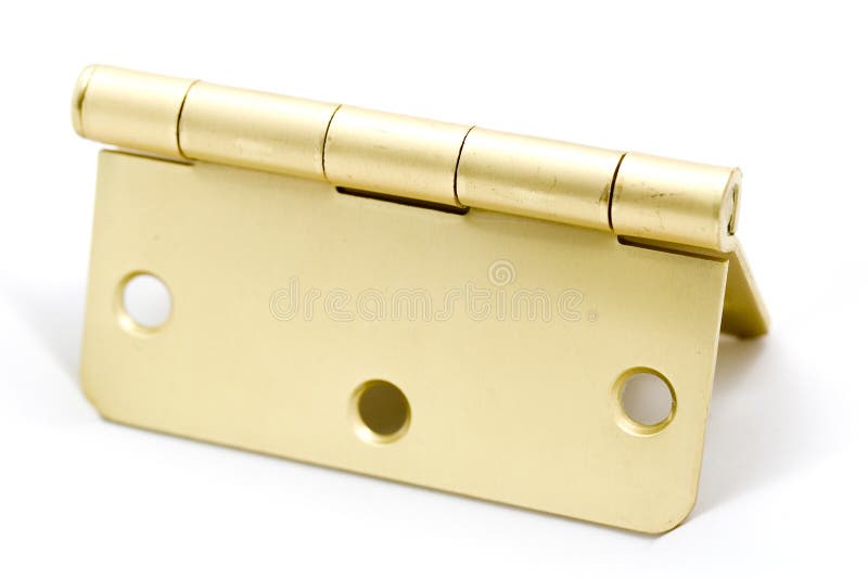 A macro shot of a brass hinge over a white background.