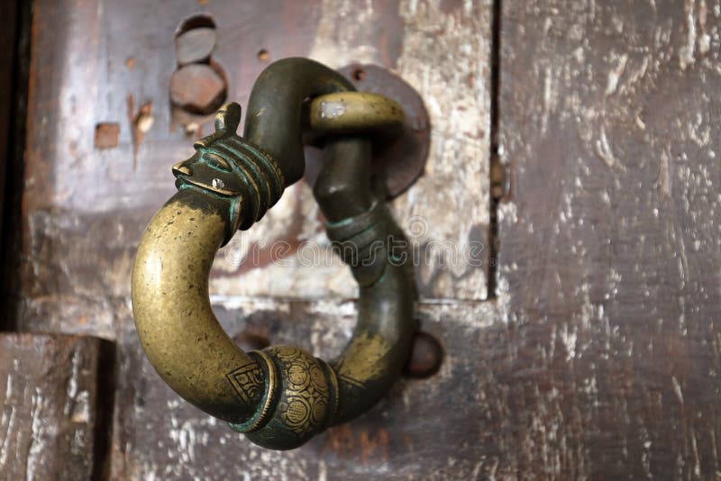 Brass Ring As Door Handle in the Cave Temple of Dambulla in Sri Lanka