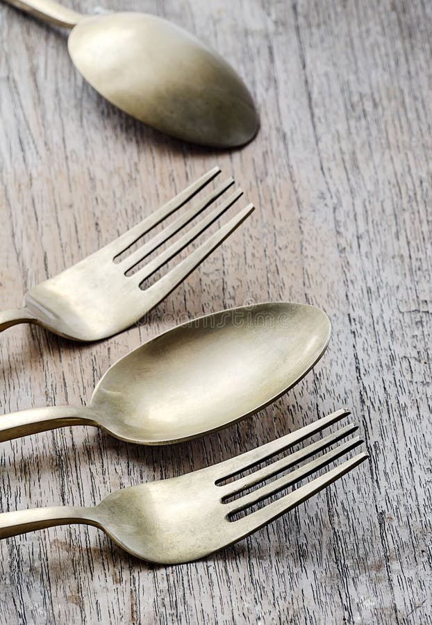 Brass spoon and fork stock image. Image of aged, vintage 54701827