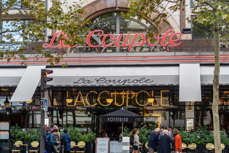 Paris, France - September 28 2019: Brasserie La Coupole in the Montparnasse Quarter, one of the most famous Parisian cafes. Paris, France - September 28 2019: Brasserie La Coupole in the Montparnasse Quarter, one of the most famous Parisian cafes.