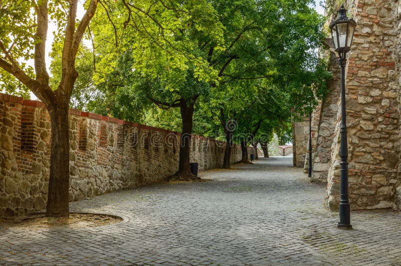 Bratislava castle, entrance to the castle through the alley with historic walls