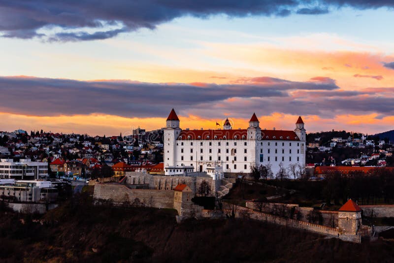 Bratislava: aerial view of Bratislava castle standing above the old town at sunset
