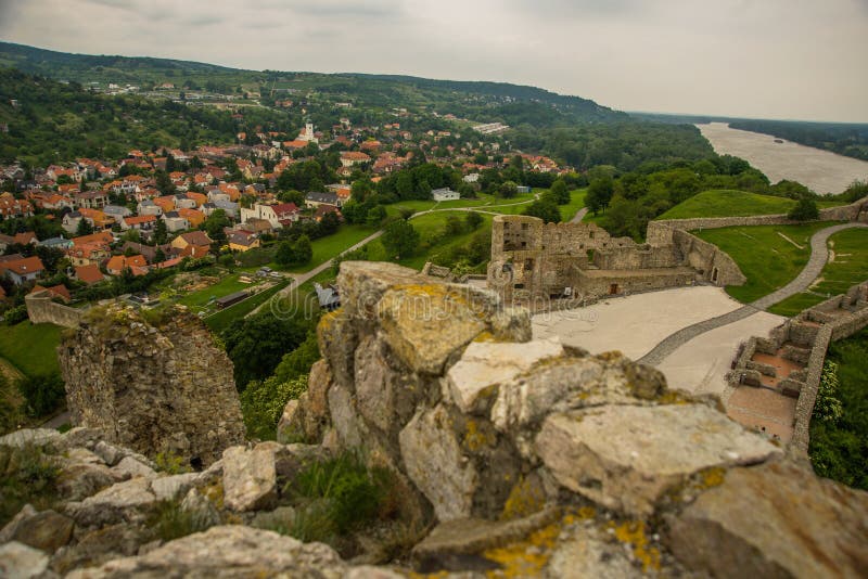 BRATISLAVA, SLOVAKIA: Beautiful landscape with hills, trees, meadows and village houses near the fortress- Devin Castle