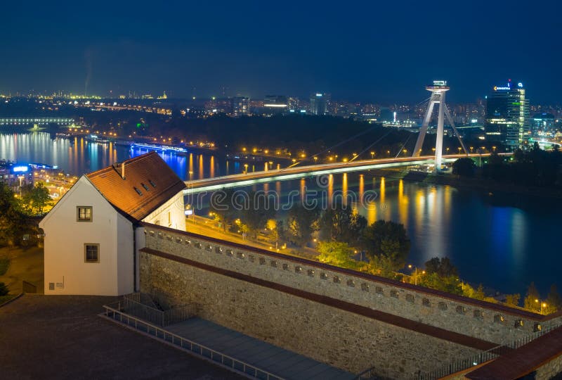 Night view from the Bratislava Castle on the Danube River and futuristic bridge SNP stock images Night view from the Bratislava Castle on the Danube River and futuristic bridge SNP stock images