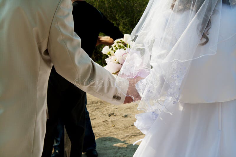 Wedding Couple. Beautiful young bride and bridegroom waiting for ceremony. Wedding Couple. Beautiful young bride and bridegroom waiting for ceremony