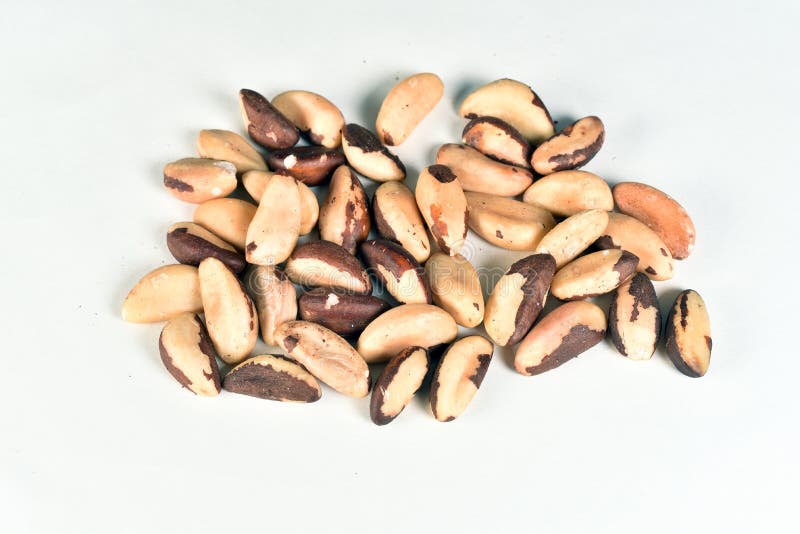 Brazil Nuts on the White Table, Typical Brazilian Fruit Stock Photo
