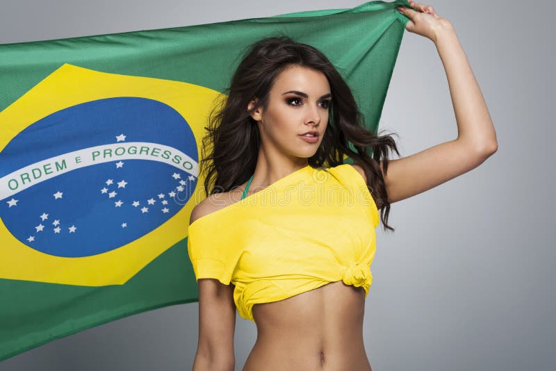 Pensive beautiful brazilian female football fan. Pensive beautiful brazilian female football fan