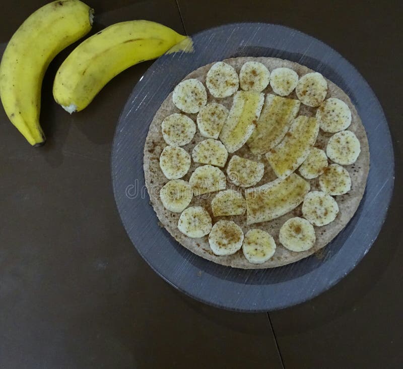 Brazilian Dessert, Banana Pizza with Cinnamon. Stock Photo Image of