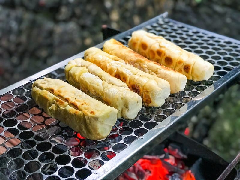 Brazilian Garlic Bread Roasted on the Grill on a Barbecue Stock Photo