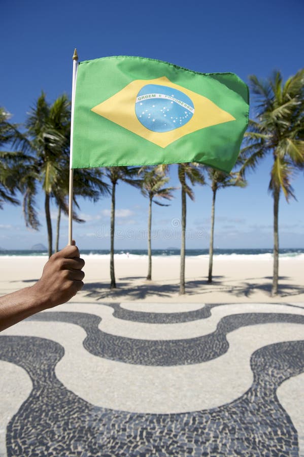 Brazilian Hand Waving Flag Copacabana Rio Brazil royalty free stock photo Brazilian Hand Waving Flag Copacabana Rio Brazil royalty free stock photo