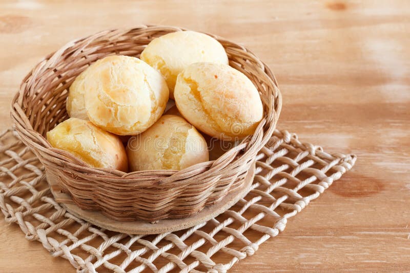 Brazilian snack cheese bread (pao de queijo) in wicker basket