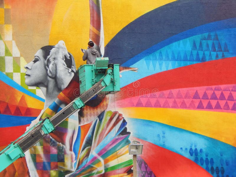 Brazilian street artist Eduardo Kobra is painting a portrait of ballerina Maya Plisetskaya in the centre of Moscow. royalty free stock photography Brazilian street artist Eduardo Kobra is painting a portrait of ballerina Maya Plisetskaya in the centre of Moscow. royalty free stock photography