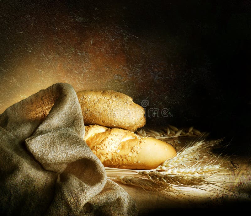 Alten Stil stilleben mit Brot und Weizen.