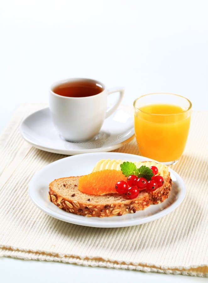 Bread With Butter, Cup Of Tea And Orange Juice Stock Photo Image of