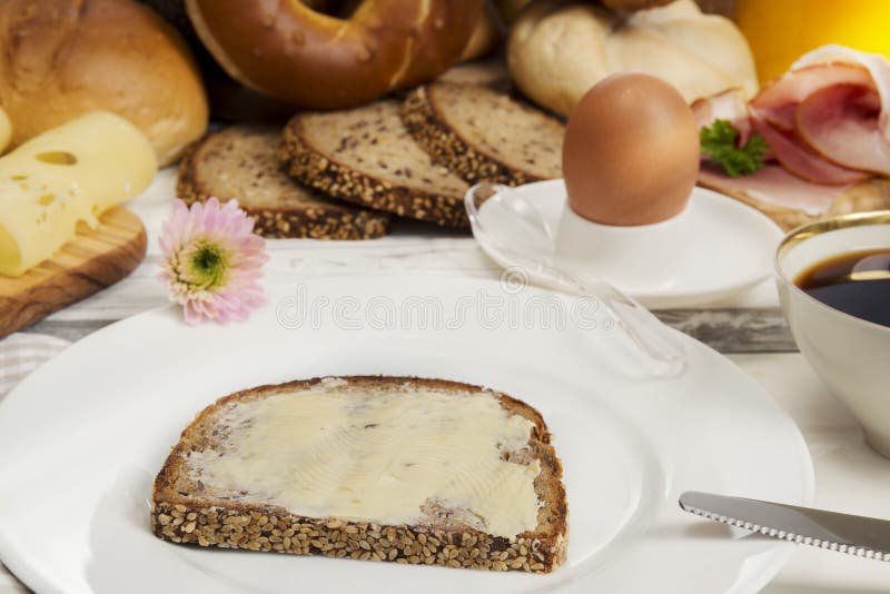 Bread and Butter,egg, Coffee,cheese, Ham for Breakfast Stock Photo