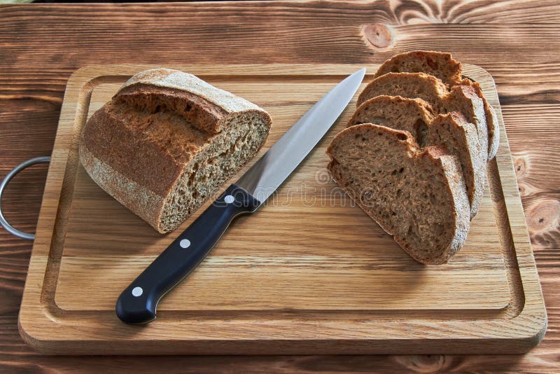 Bread on a cutting board stock image. Image of board 175099831