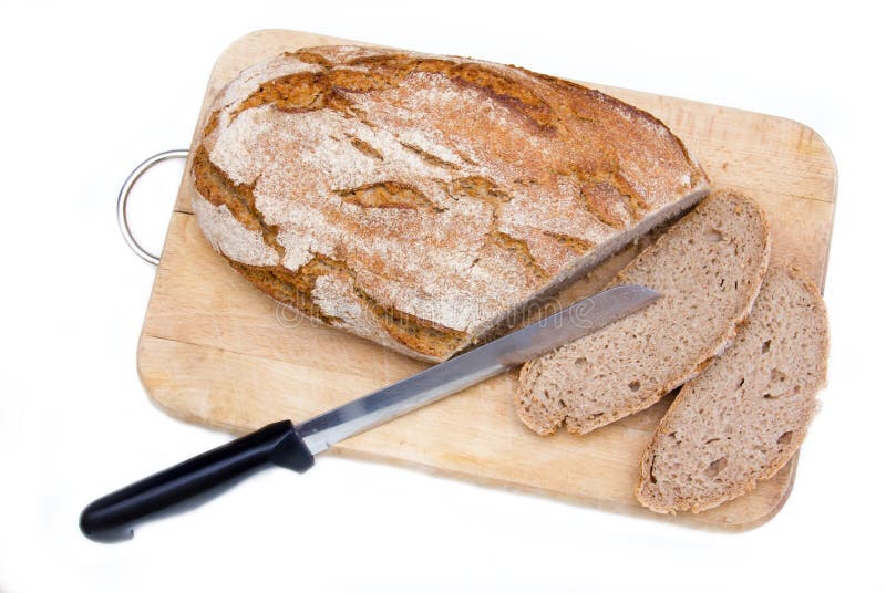 Bread on Cutting Board with a Knife from Above Stock Photo Image of