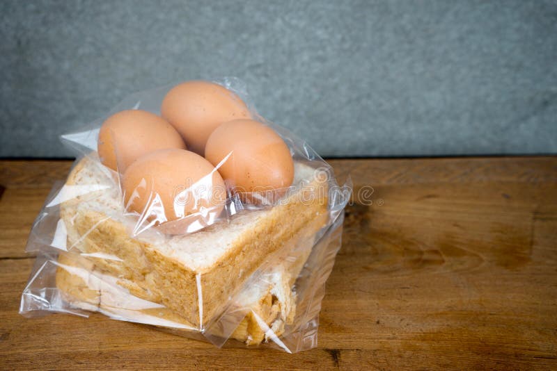 Bread and Egg in Plastic Bag Stock Image Image of grain, grocery