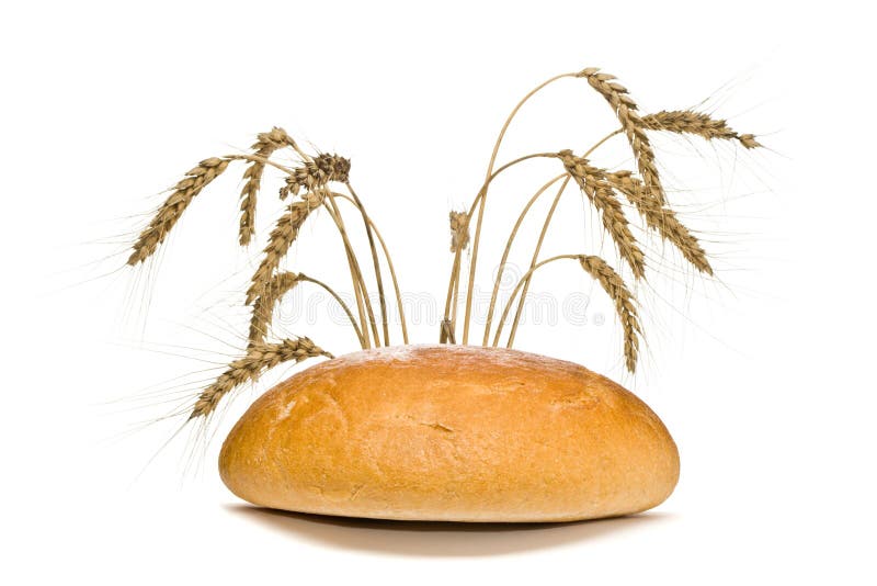 Bread loaf and wheat spikes, isolated