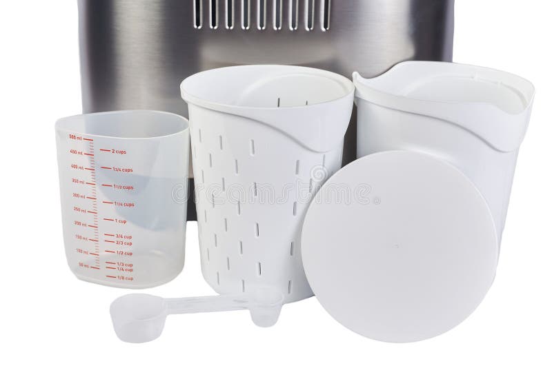 Bread Maker Accessories Isolated on White Background. Plastic Measuring