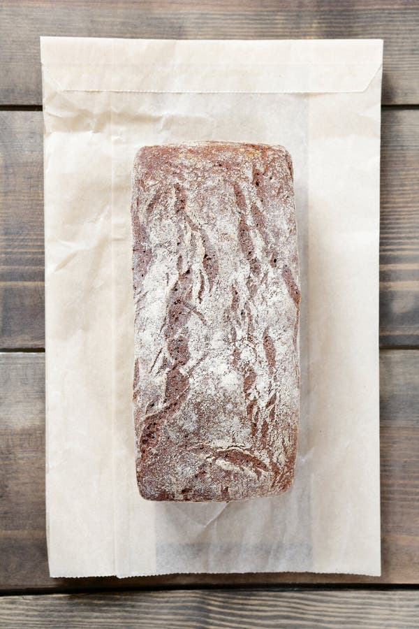 Bread on paper packaging stock photo. Image of crust 51525636