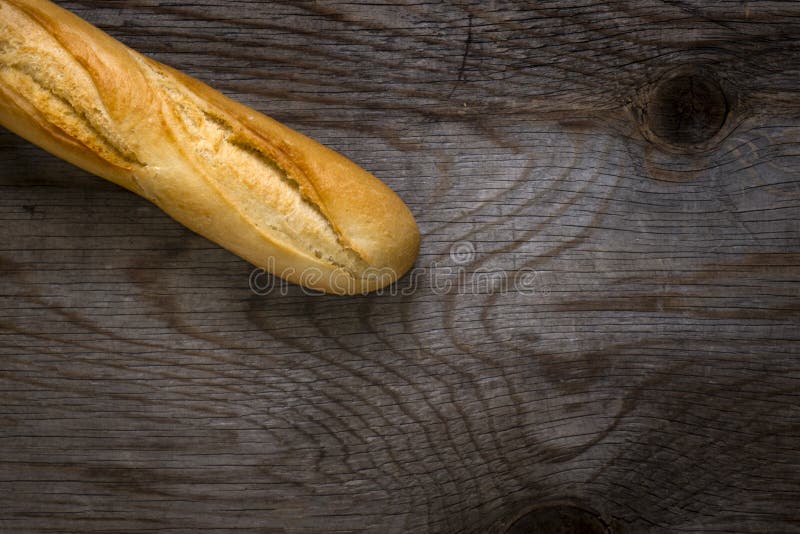 Pâine pe masă de lemn rustic stock photography