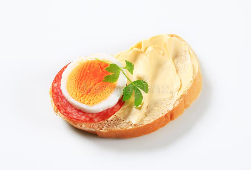 Bread with salami and egg stock image. Image of open 25673517