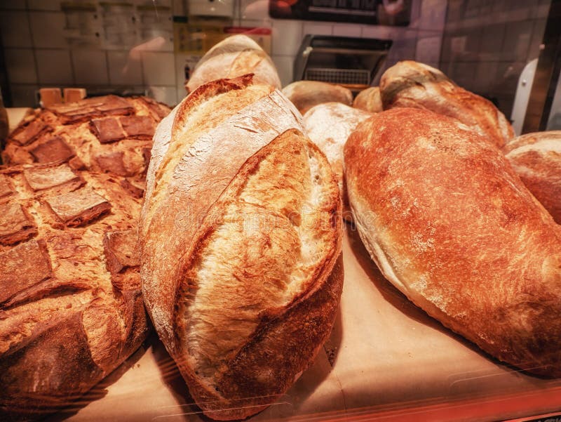 Bread on a Shelf in a Bakery Closeup on a Dark Background Stock Image