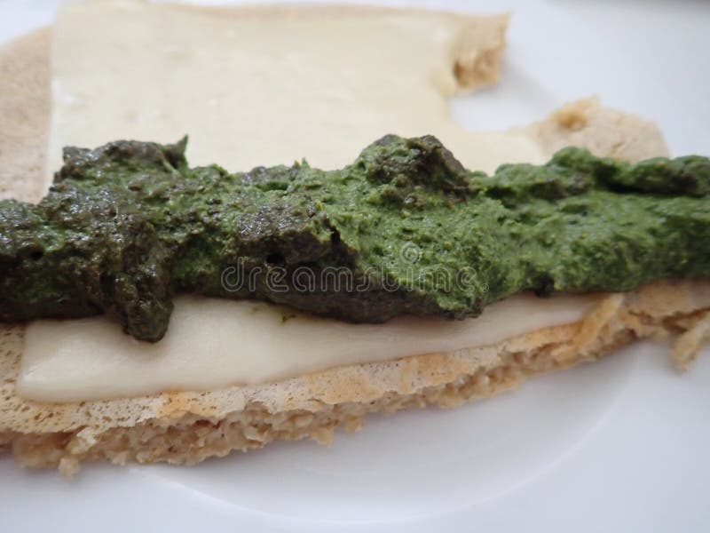 Bread with Slice of Cheese and Green Pesto Stock Photo Image of