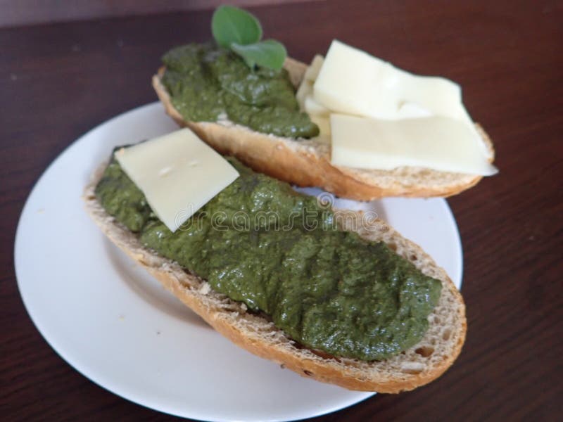 Bread with Slice of Cheese and Green Pesto Stock Image Image of