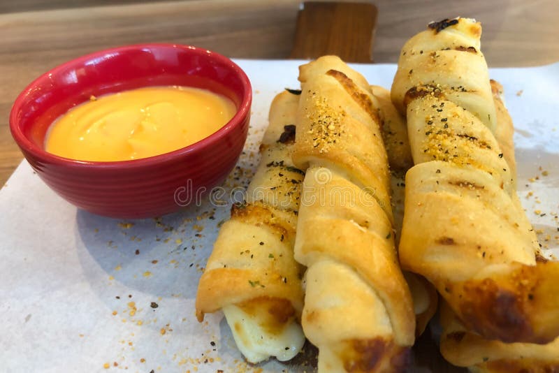 Bread Stick with Dip Cheeses on a Board in Restaurant Stock Image