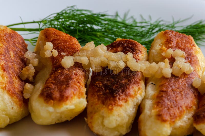 Breaded cheese and kefir sticks served in white plate. Made from cheese, flour and kefir. stock photography Breaded cheese and kefir sticks served in white plate. Made from cheese, flour and kefir. stock photography
