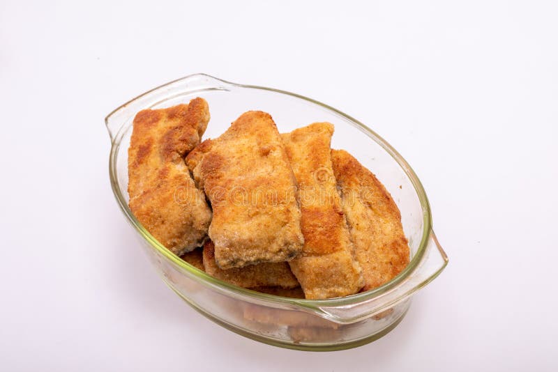 Breaded Fish Fillets in a Glass, Heatresistant Dish. Stock Photo