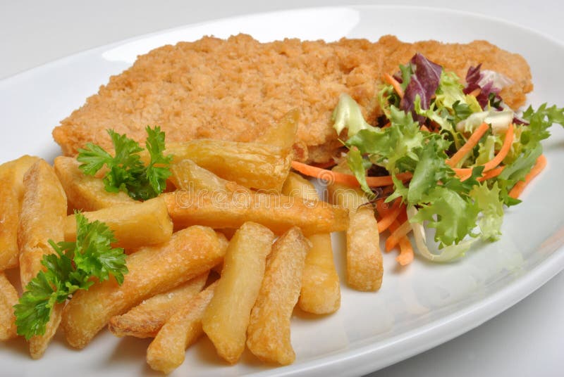 Breaded Fish Steak with Chips Stock Photo Image of delicious, herbs 11821736