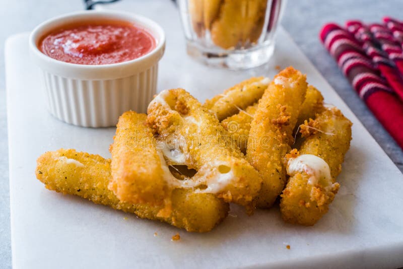 Breaded Fried Mozzarella Cheese Sticks with Ketchup Dipping Sauce Stock ...