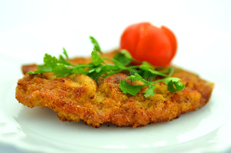 Breaded pork chop on a plate