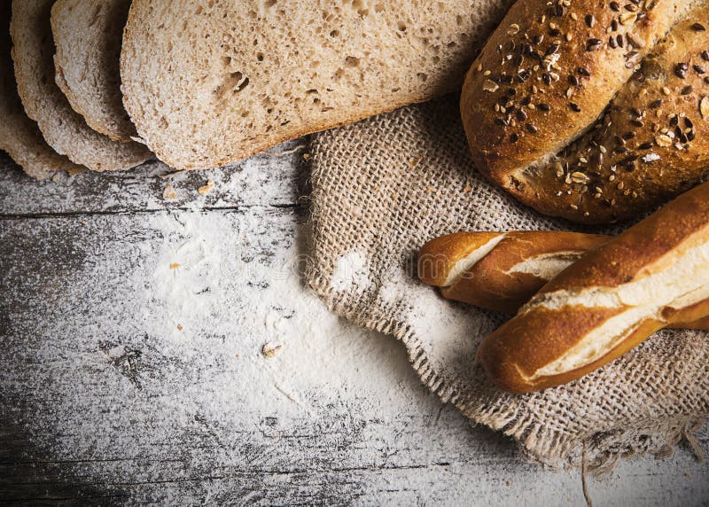 Breads on wooden table stock image. Image of brown, pastry - 108028427