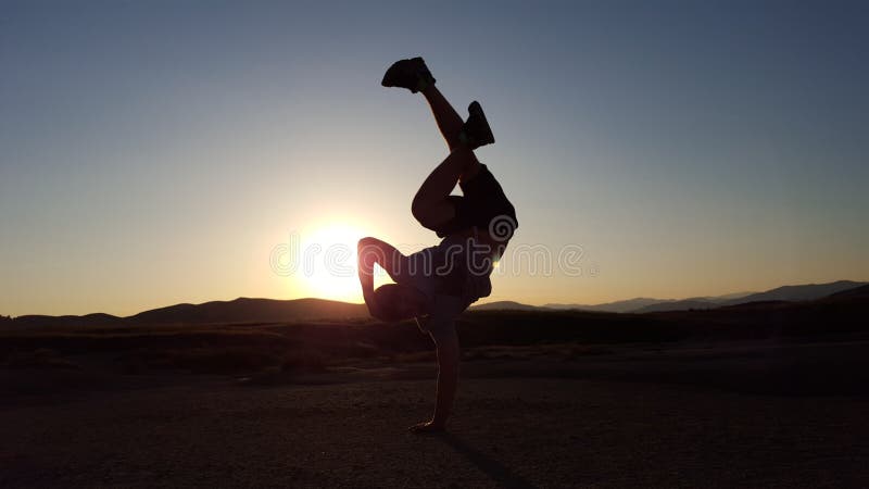 Breakdance figure in the sunset stock photography Breakdance figure in the sunset stock photography