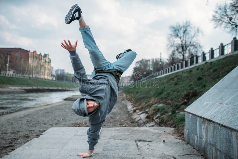 Breakdance performer, upside down motion on street royalty free stock image