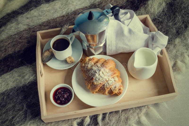 breakfast-bed-coffee-croissant-milk-tray-wool-blanket-toned-62289127.jpg