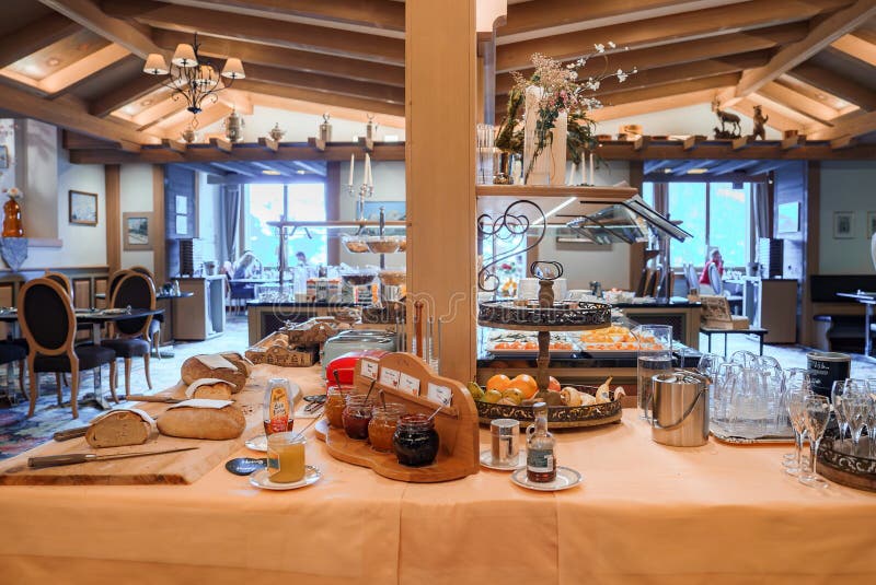 Well Appointed Breakfast Buffet Setup in Cozy Room Editorial Stock