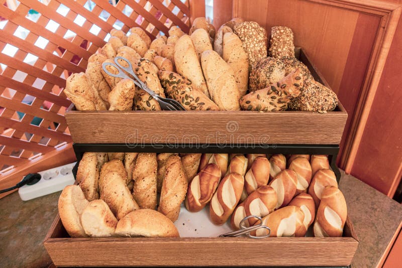 A Breakfast Buffet There are Two Baskets Filled with Different Kinds of