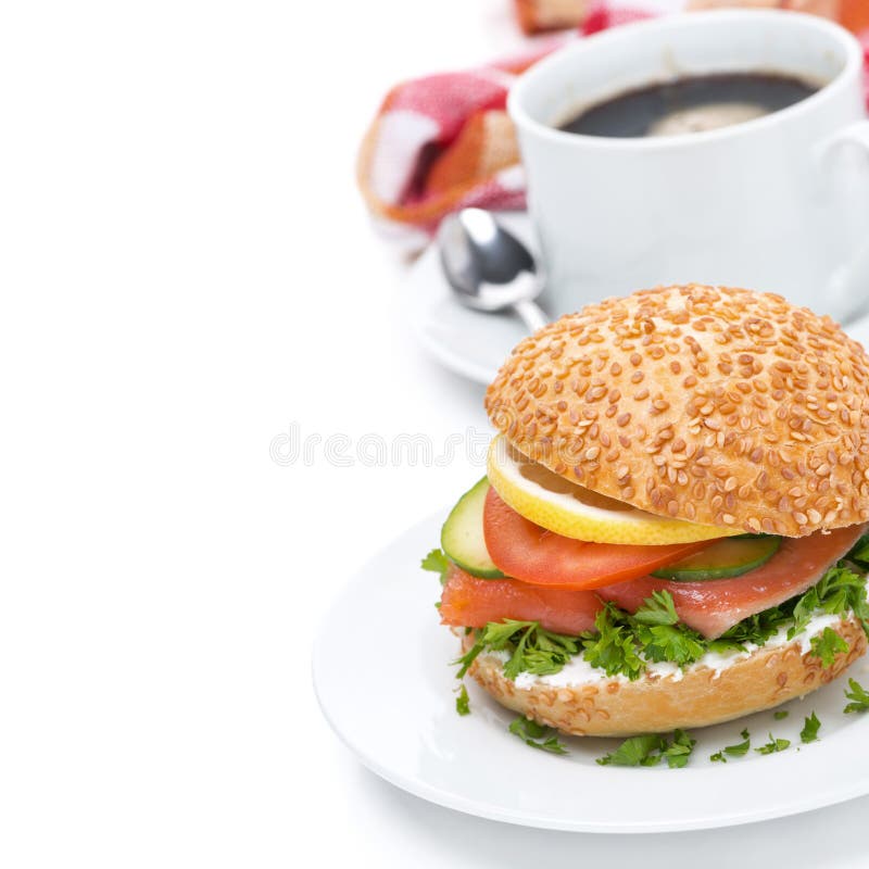 Breakfast - burger with salmon, vegetables and coffee