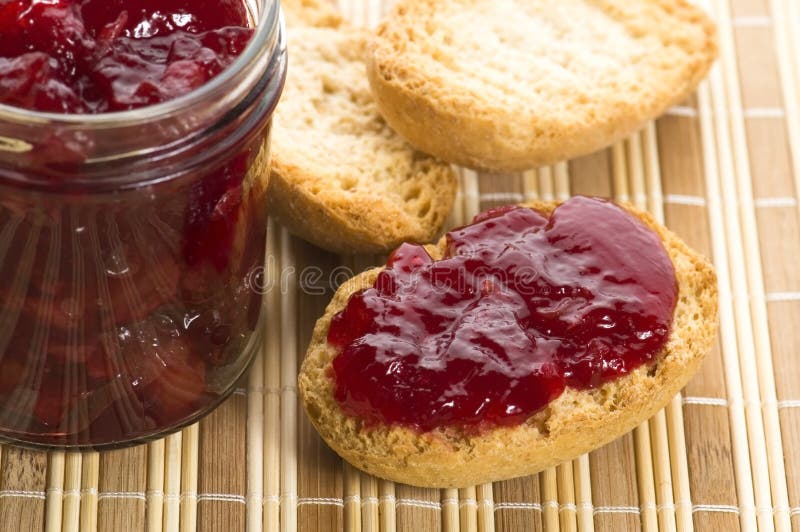 Breakfast of cherry jam on toast