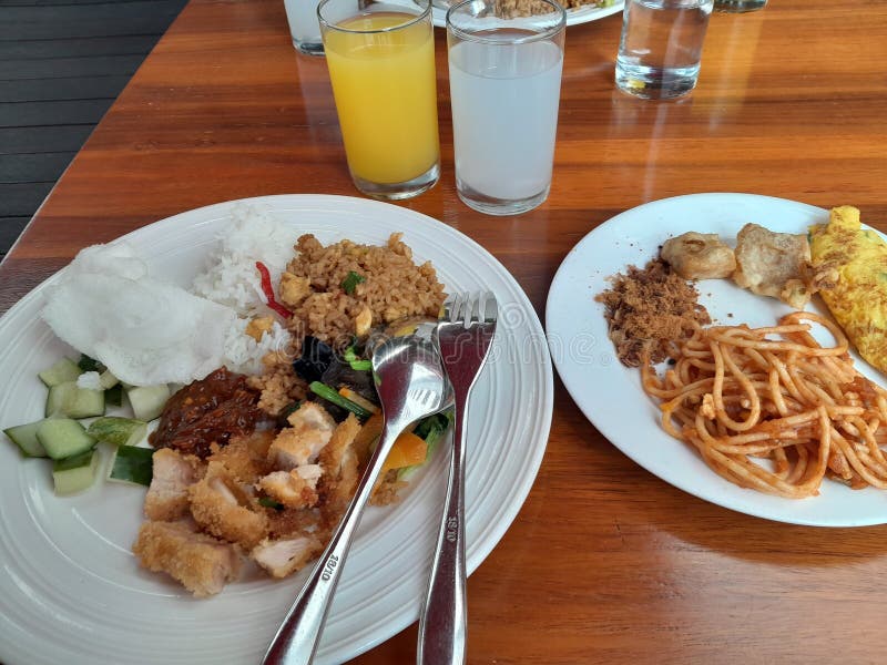 Breakfast with a Combination of White Rice and Fried Rice Stock Photo