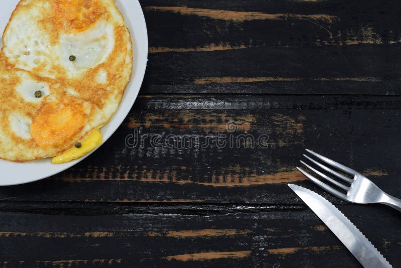 Breakfast Consisting of Fried Eggs with a Slice of Bread Stock Image